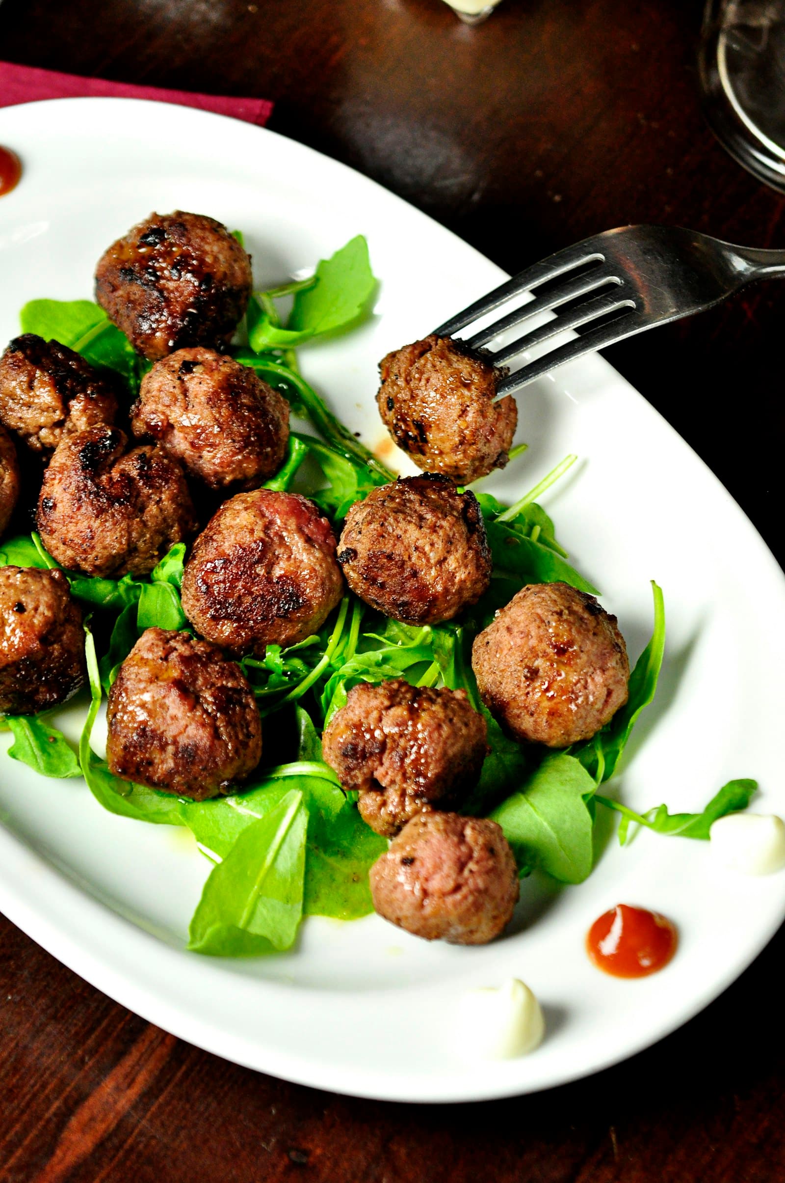 Meatballs on a bed of arugula